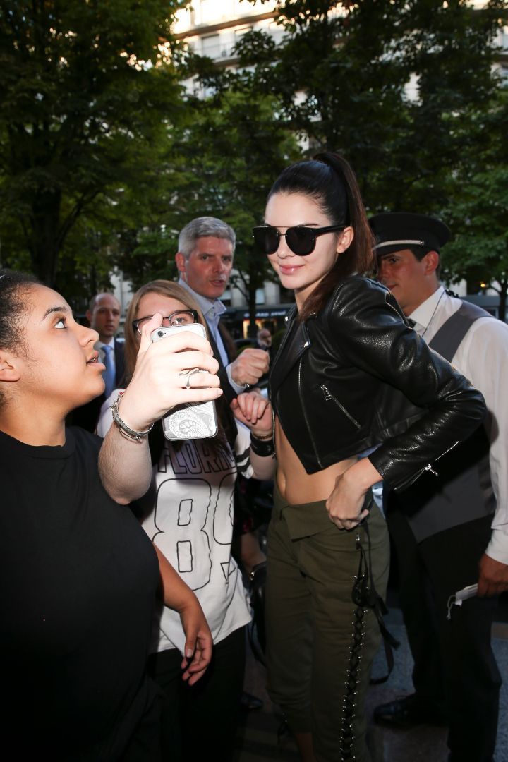 So nice we added her twice. Here’s Kendall Jenner again taking a selfie with some fans during Haute-Couture Fashion Week 2015 in Paris.