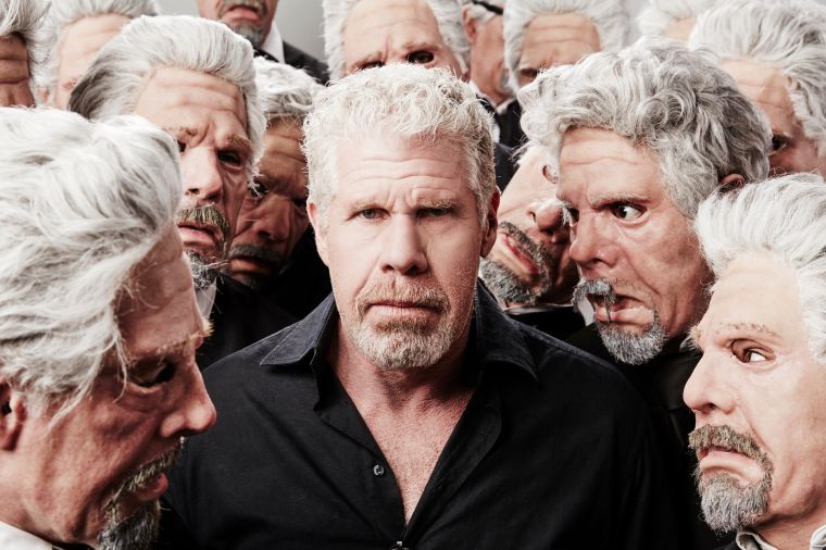Actor Ron Perlman poses for a portrait with his impersonators at the Getty Images Portrait Studio powered by Samsung Galaxy at Comic-Con International 2015 at Hard Rock Hotel San Diego.