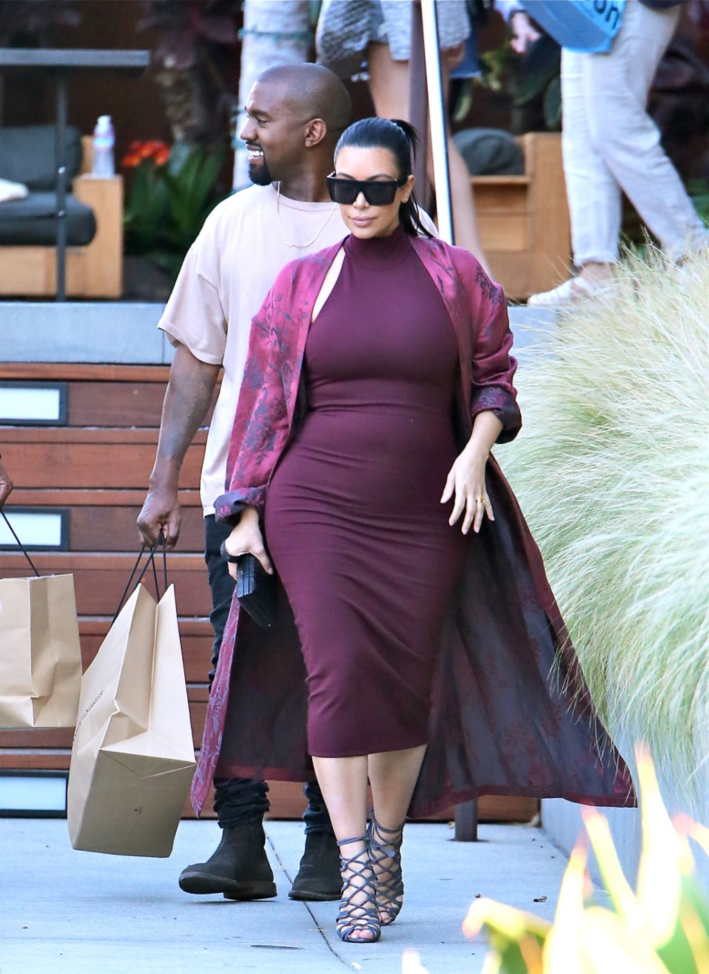 Kim Kardashian, Kanye West, and Steve Stoute eat at Nobu