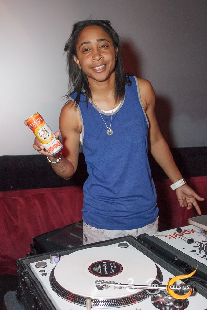DJ Spark cools down with the night’s drink of choice: Celsius.