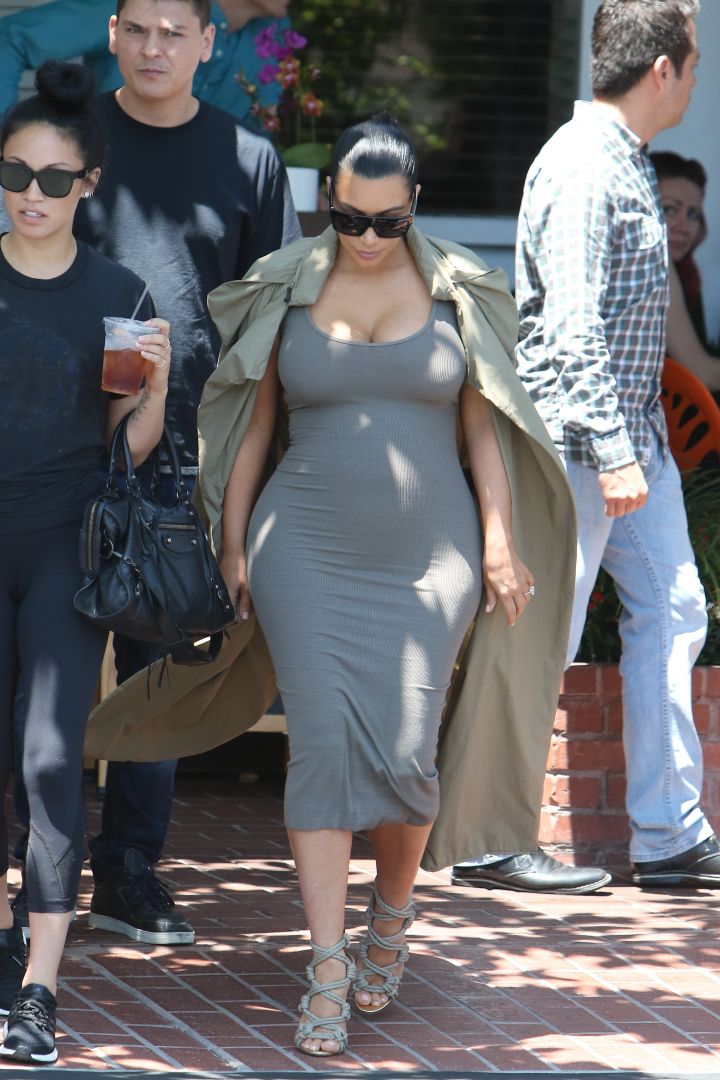 Kim Kardashian showed off her barely there bump while out for lunch in LA