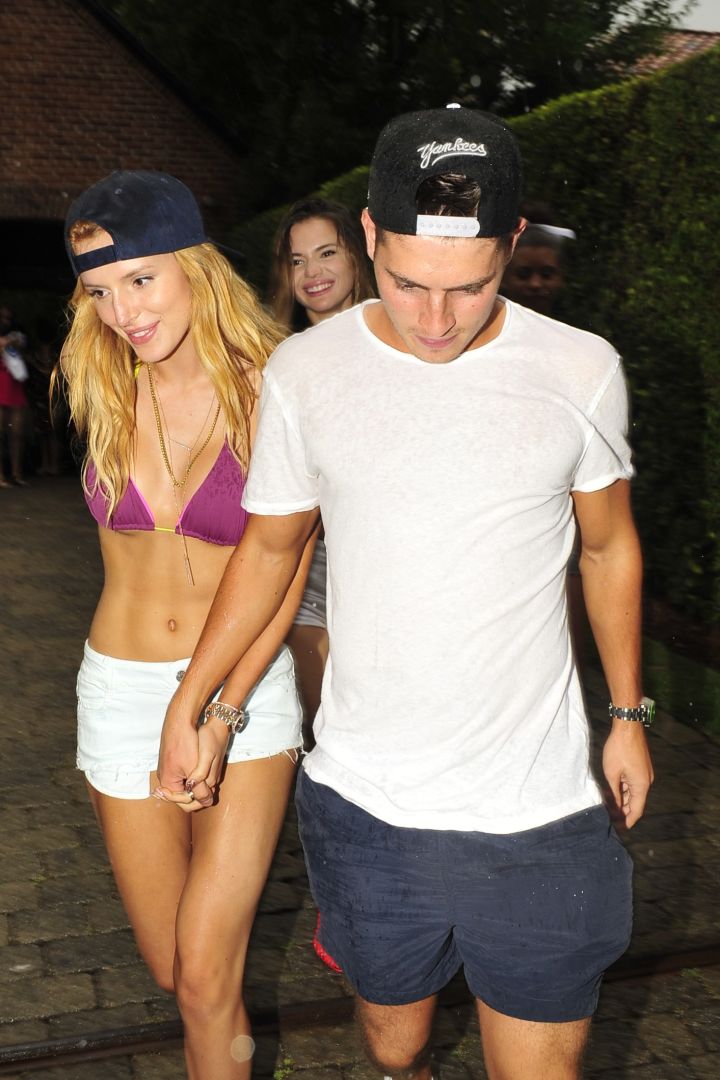 Look who’s holding hands…it’s Bella Thorne and Gregg Sulkin at Just Jared’s pool party.