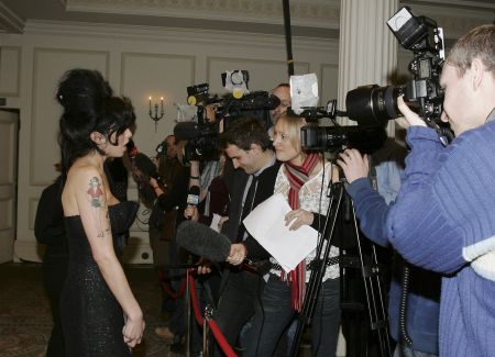Amy after receiving the Pop award for 'Back to Black' at the South Bank Show Awards
