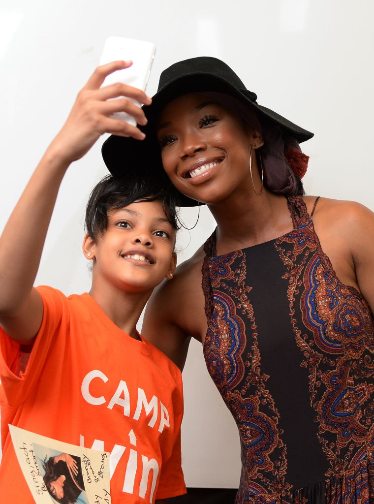 Brandy has a heart of gold. Here she is taking a selfie with one of the kids from the Precious Dreams Foundation. The Broadway star provided comfort items and motivational words to NYC Homeless Youth this week. What a way to give back.