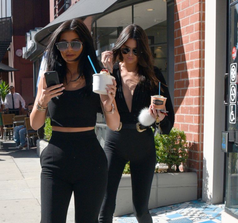 Kylie and Kendall Jenner were dressed in all black like The Omen, but that's not a wedding band on Kylie's hand.