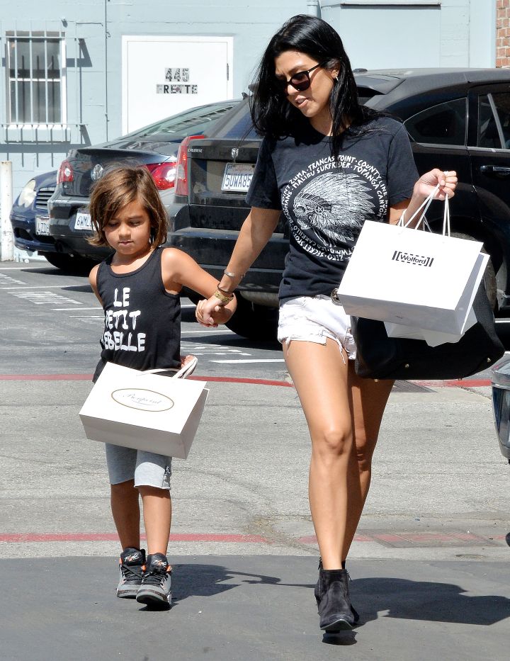 Kourtney Kardashian is built for this mommy thing. Here she is with her son Mason shopping in Beverly Hills.