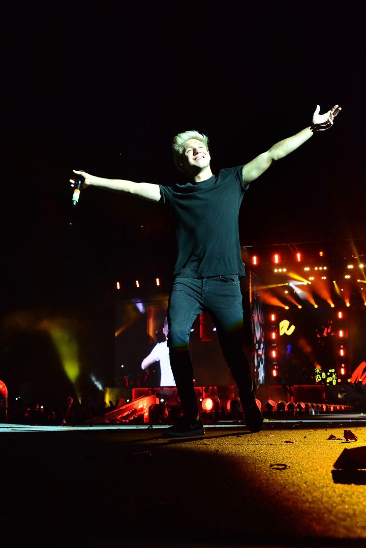 Niall Horan accepts love from the crowd during One Direction’s New York tour stop.