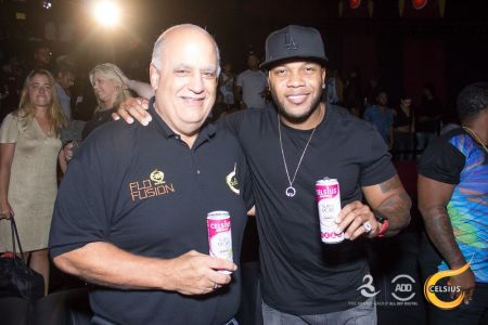 Flo Rida mingles with guests.