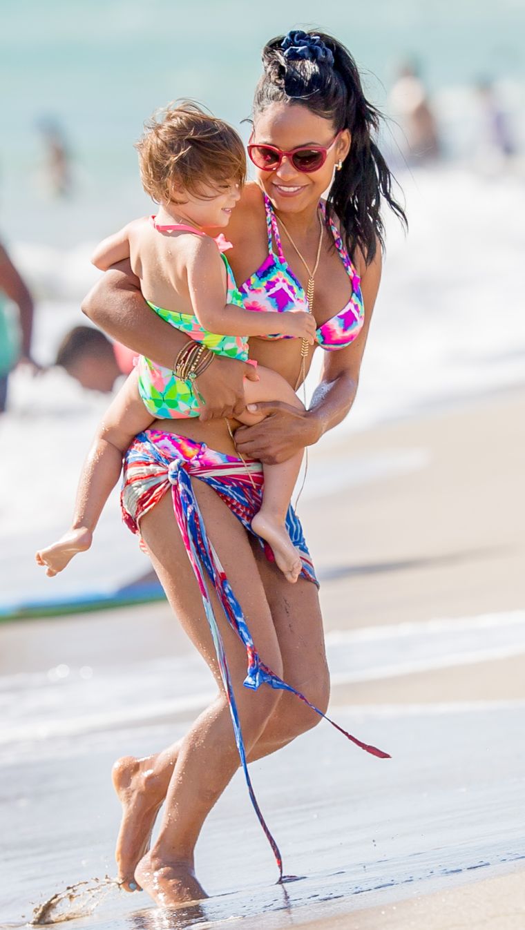 Christina Milian frolicked on Malibu Beach while filming scenes for her new movie “Grandfathered” with John Stamos.