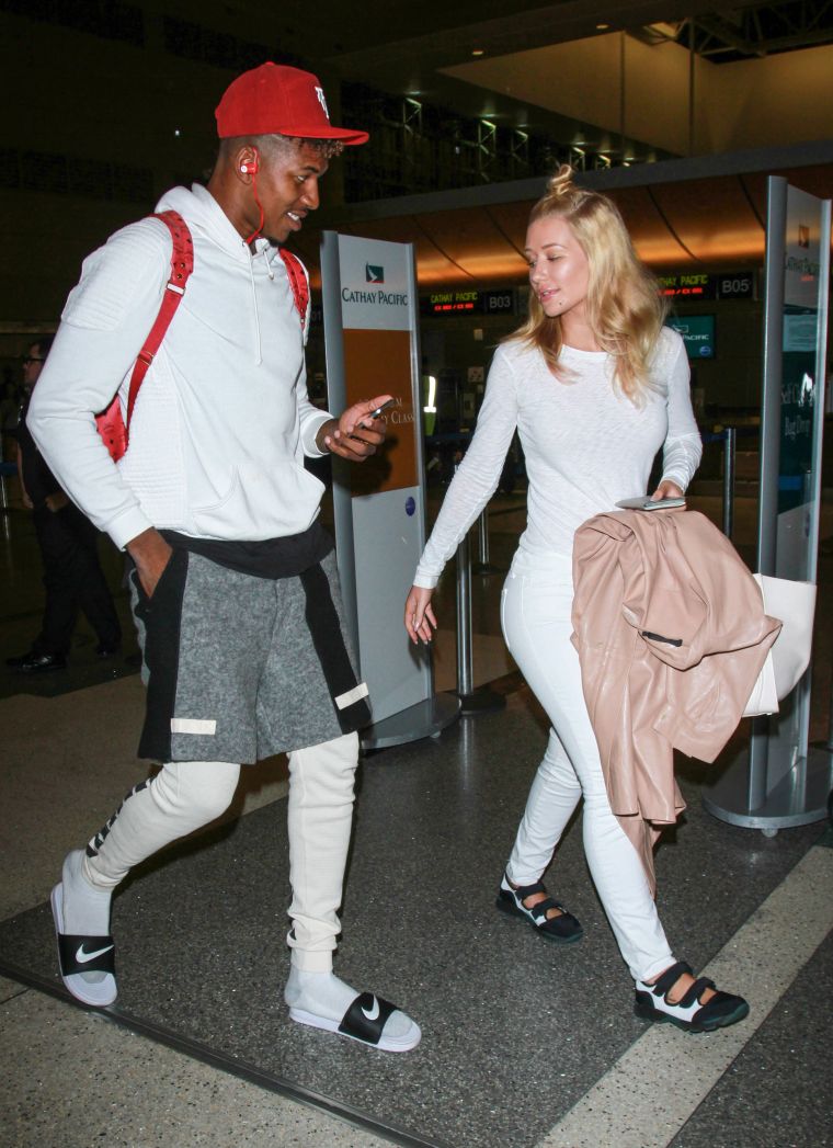 Nick Young and Iggy Azalea got lovey-dovey at LAX airport.