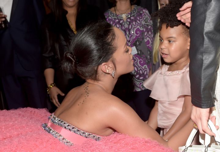 Blue makes small talk with Rihanna at the 2015 Grammys.