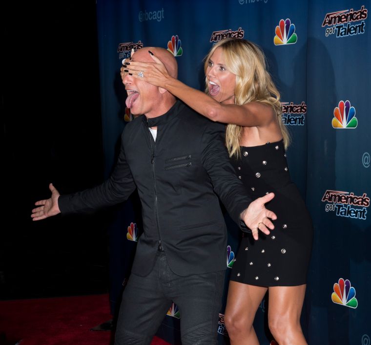 Howie Mandel and Heidi Klum joked around on the “America’s Got Talent” Season 10 Live Post-Show Red Carpet.