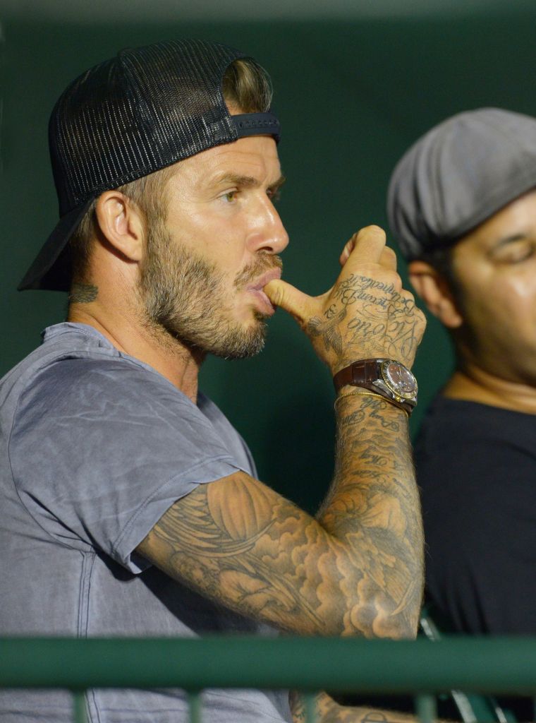 David Beckham needed a napkin as he watched a baseball game between the Angels and Chicago White Sox.