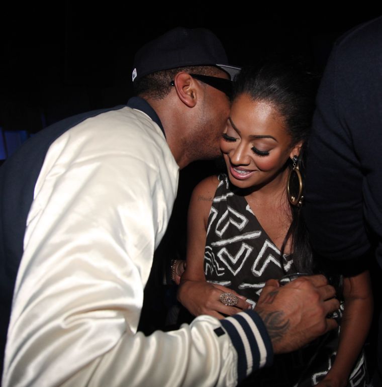 Whispering sweet nothings.