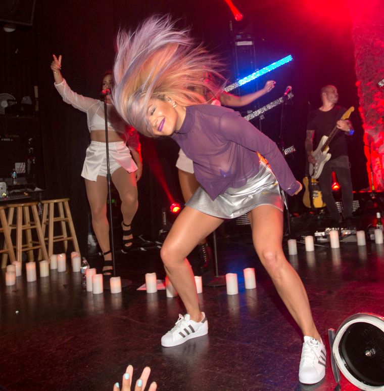 Rita Ora wears a see-through top, pasties, and a short mini skirt while performing at the El Rey Theatre in Los Angeles, CA. She invited rumored boyfriend Wiz Khalifa to watch her set.