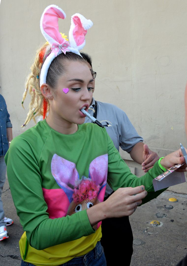 Miley’s sweaters are always fun