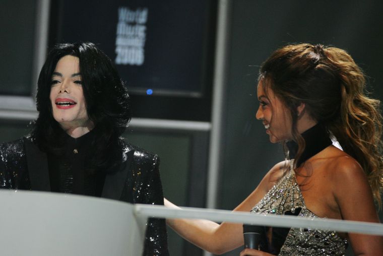 Receiving a World Music Award from Michael Jackson at just 25 years old.