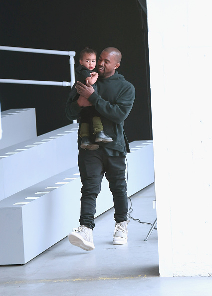 Twinsies! North and Kanye rock hoodies.