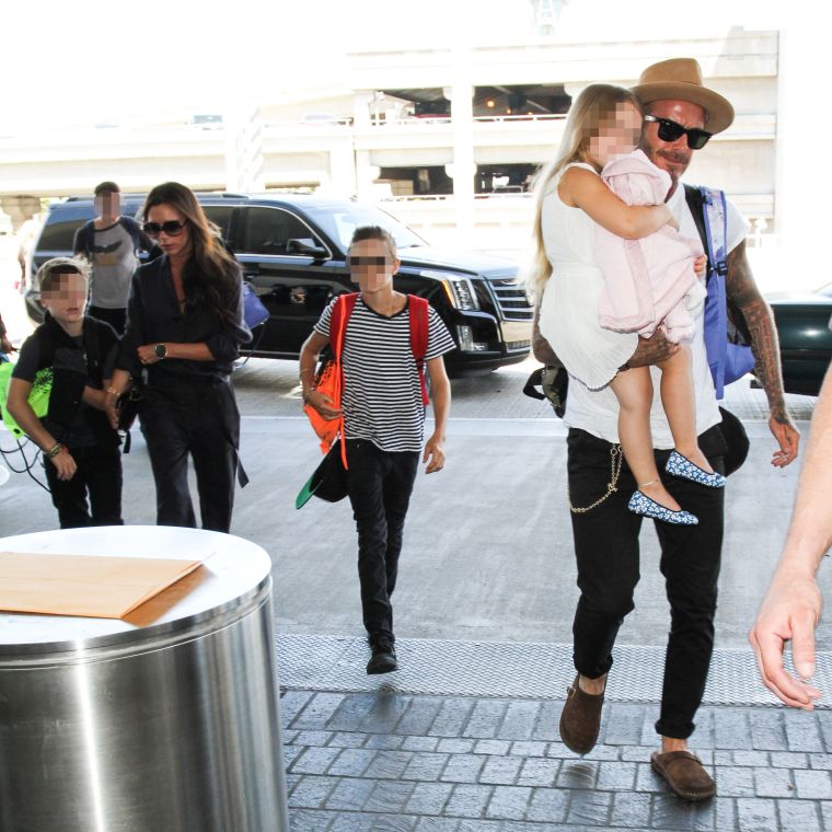David Beckham, wife Victoria Beckham, children Brooklyn Joseph Beckham, Romeo James Beckham, Harper Seven Beckham, and Cruz David Beckham were spotted at LAX Airport.