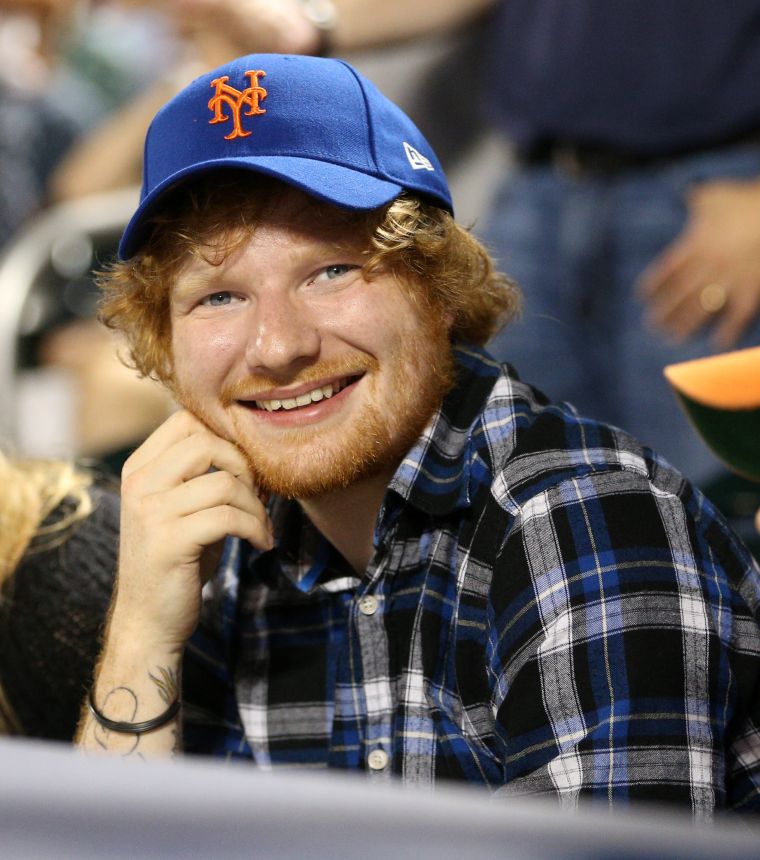 Our boy Ed Sheeran flashes a smile while out with his mystery lady, this time at the Philadelphia Phillies Vs. New York Mets game. We didn’t show her because we respect his privacy.