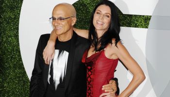 Beats co-founder Jimmy Iovine (L) and model Liberty Ross arrive at the 2014 GQ Men Of The Year Party at Chateau Marmont on December 4, 2014 in Los Angeles, California.