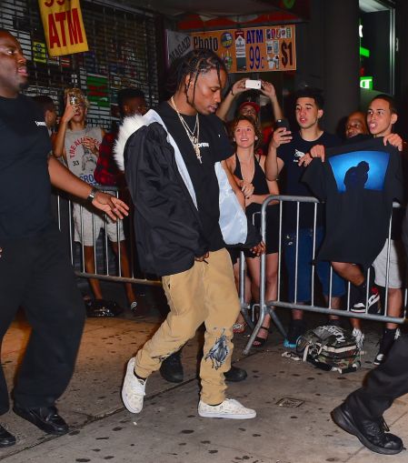 Travi$ Scott leaves his 3-hour concert in NYC, with rumored gal pal Rihanna not far behind.