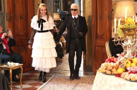 Cara Delevingne and Karl at his Chanel show. Cara is always his main model gal.