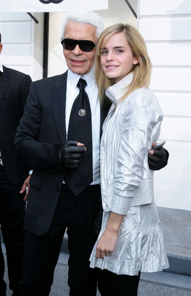 A young Emma Watson was all smiles with the Chanel mastermind.