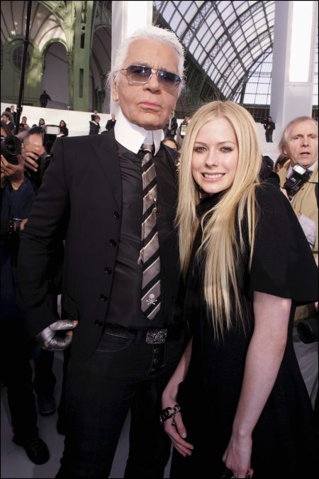 Avril Lavigne put on a smile for Karl.