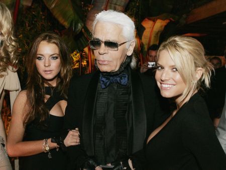 Karl hanging out with Lindsay Lohan and Jessica Simpson.