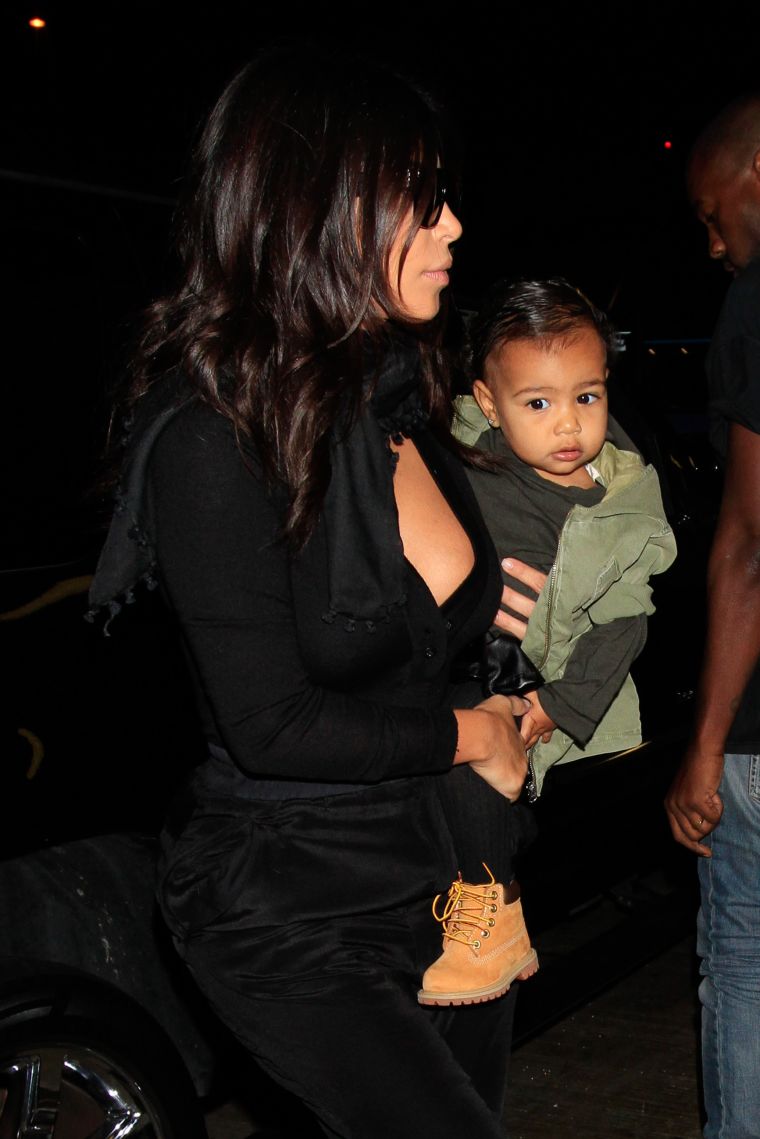 In true ‘Ye fashion, Nori rocks Timbs & a trench coat.