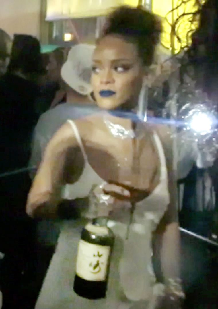 The block party host held onto her drink.