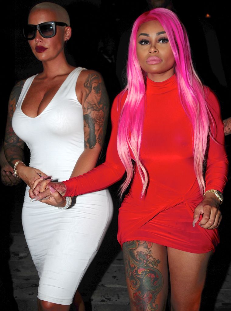 Amber Rose and her wifey Blac Chyna hit up 1OAK holding hands.