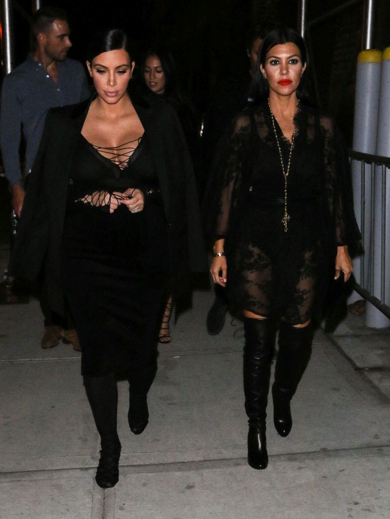 Kim Kardashian West and sister Kourtney Kardashian chopped it up at The Polo Bar in NYC.