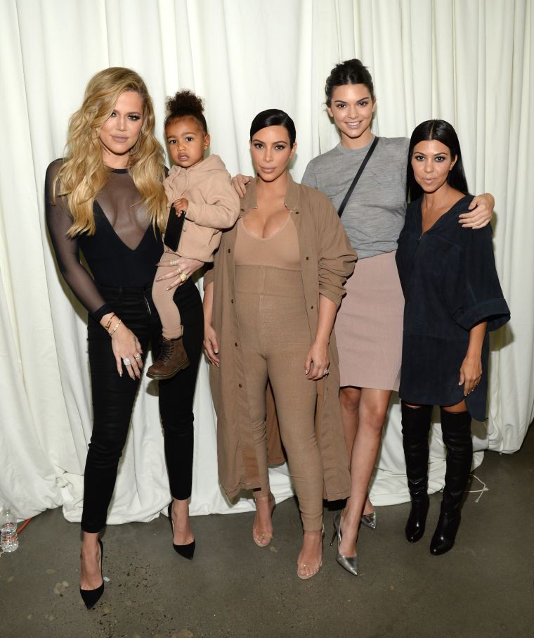 Khloe, North, Kim, Kendall, and Kourtney take a family photo backstage.