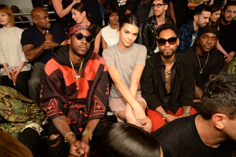 2 Chainz, Kendall, and Miguel sit on in the second row.
