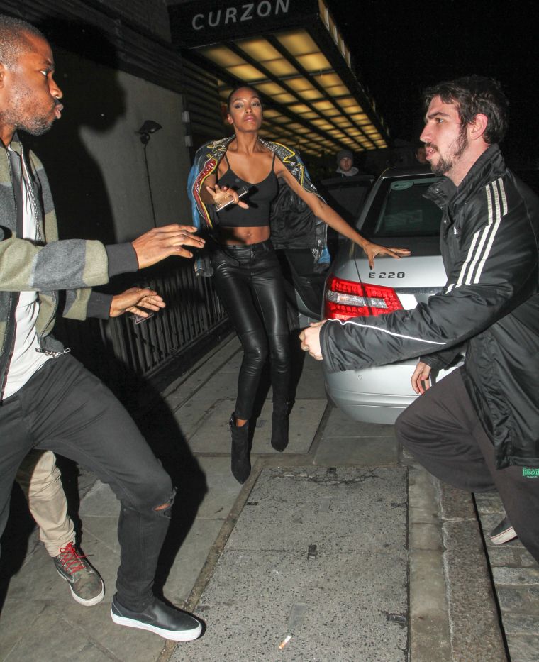 Jourdan Dunn tried to stop her friend who was attacked by a paparazzi photographer in a scuffle outside Loulu's Members Club in Mayfair, London.