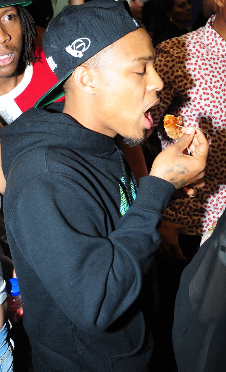 Bow Wow takes a bite of food at the Big Boy vegan restaurant launch party in North Hollywood.