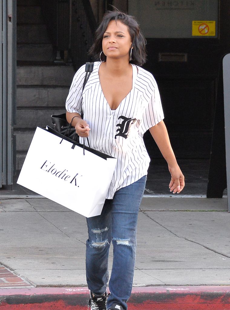 Christina Milian got a cupcake from a photographer for her birthday after going shopping in West Hollywood.