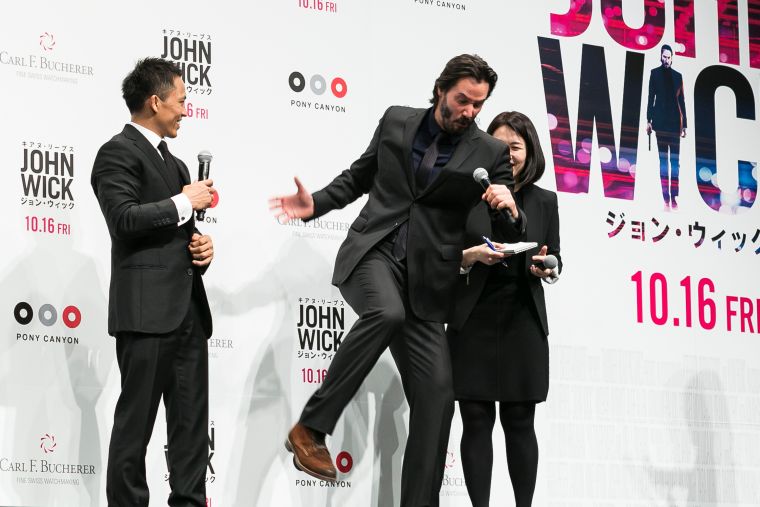 Keanu Reeves is really excited to promote his new movie “John Wick” in Japan. He’s probably acting out killing about a million people in the first 5 minutes of the film.