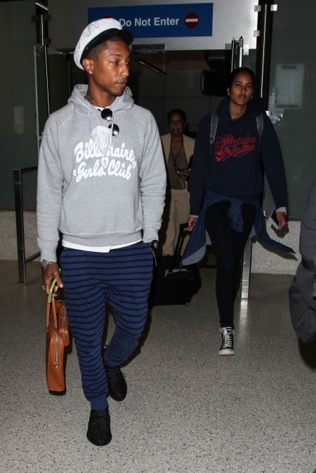 No worries Pharrell, your wife is right behind you at LAX Airport.
