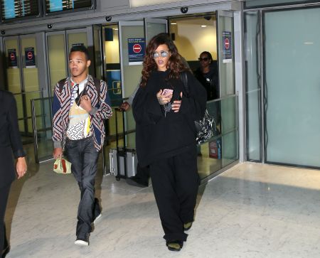 Rihanna and her little brother arrived in Paris at Charles de Gaulle airport just in time to attend Paris Fashion Week.
