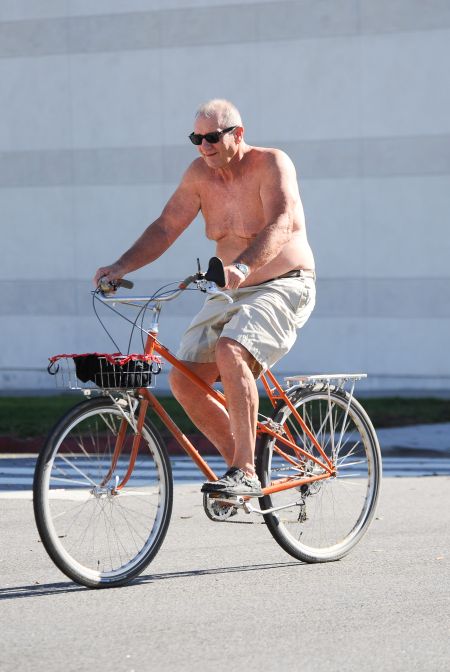 This is Ed O’Neill to some people, but to others it’s a picture of Al Bundy riding a bike shirtless.