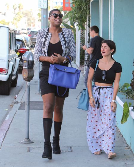EJ Johnson was very happy while walking out with a friend in Los Angeles, California.
