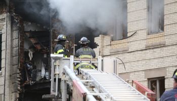 Fire fighters on the scene at a building explosion in Borough Park, Brooklyn on October 3rd, 2015
