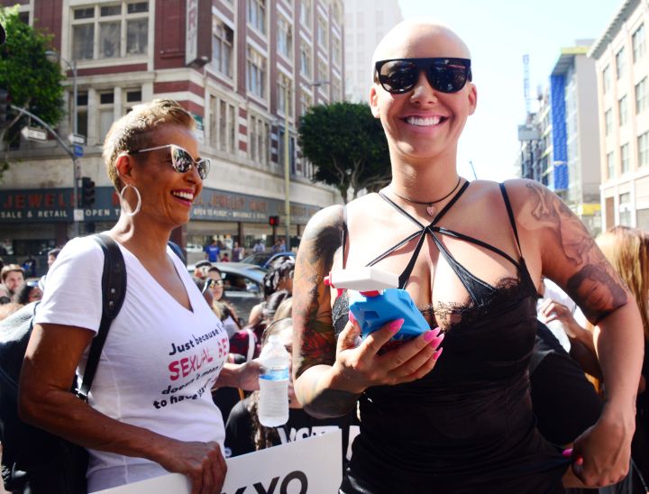 Amber Rose standing beside her mother at the 2015 SlutWalk.