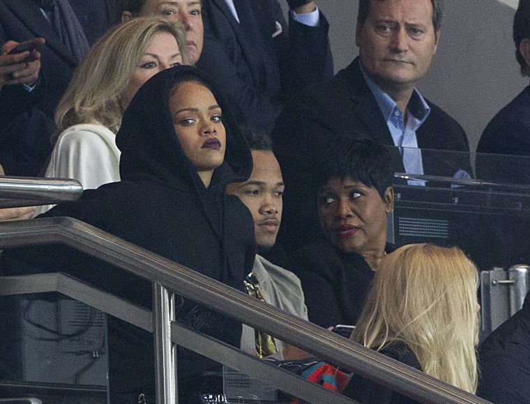 Rihanna was trying to keep it low key as she watched a soccer match with her family in Paris.
