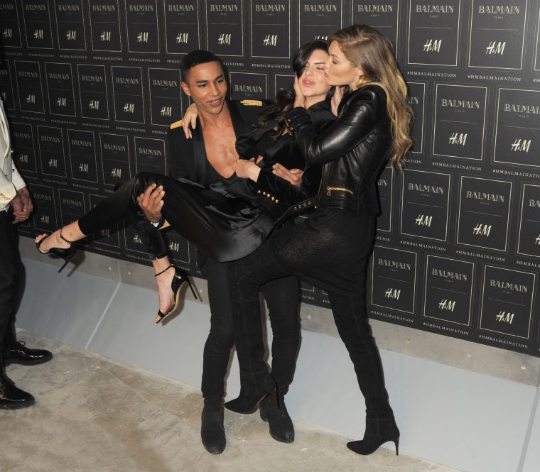 Red carpet action with Kendall, Olivier, and Gigi.