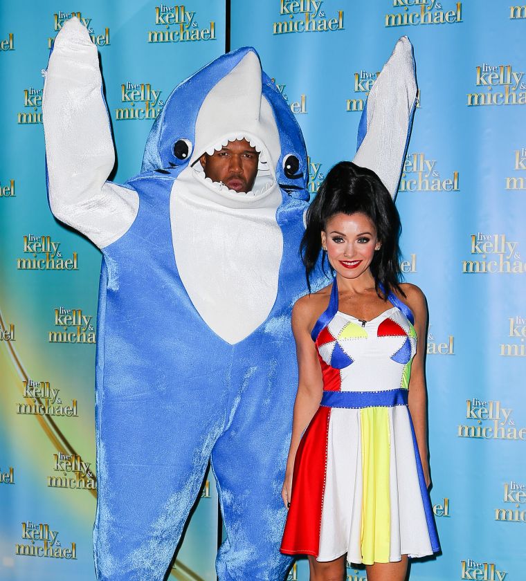 Michael Strahan and Kelly Ripa kicked off their show in costume - Left Shark and Katy Perry.