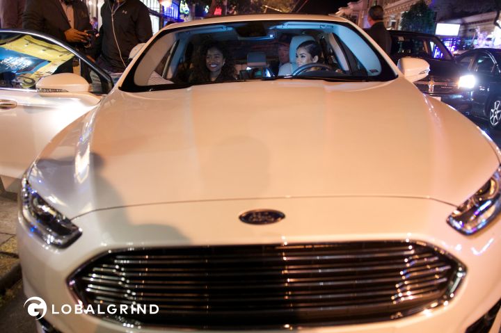 Jhene and Vashtie sit inside a 2016 Ford Fusion.